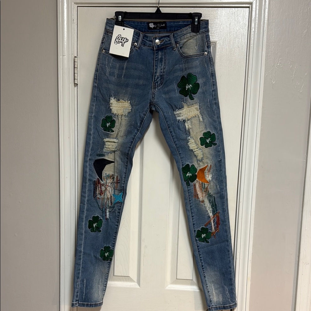 NWT Filthy Wealth Stylish Blue Distressed Jeans with Green Accents
